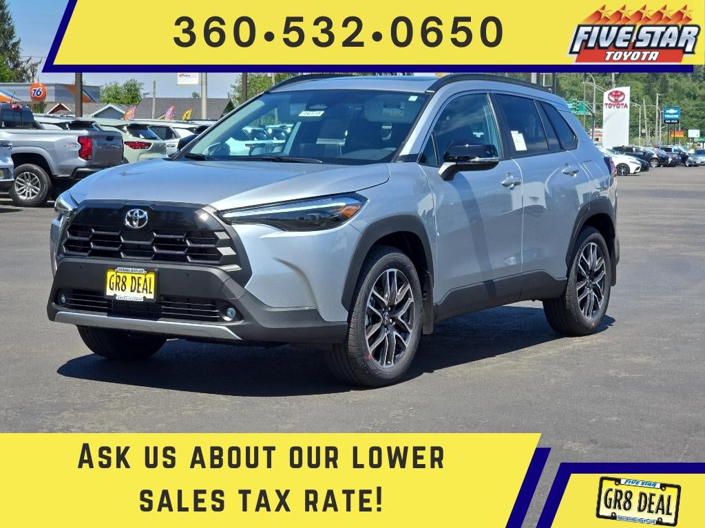 2026 Toyota Corolla Cross XLE in Sonic Silver — front three-quarter view