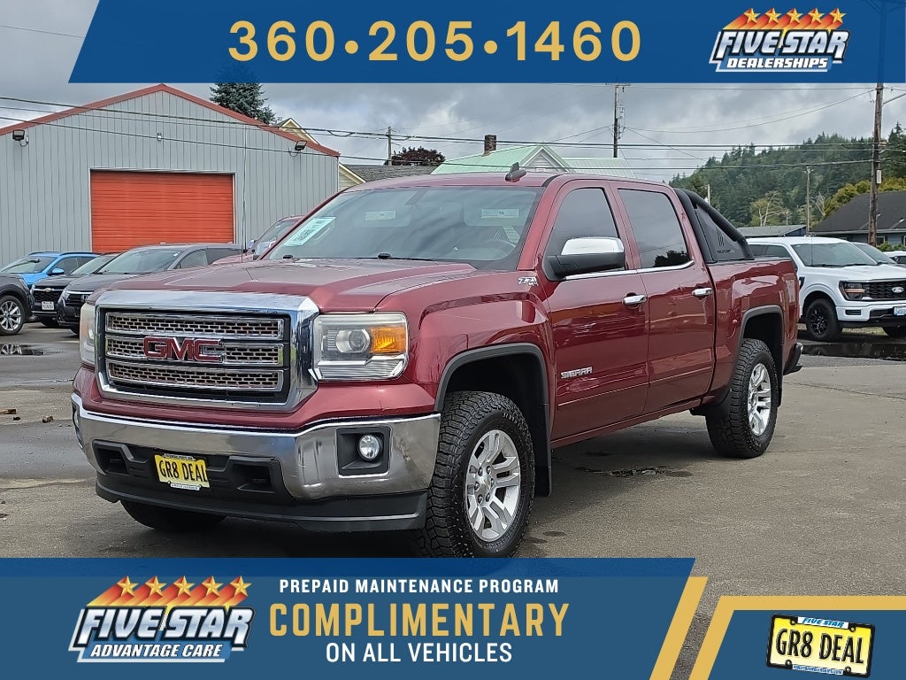 2015 GMC Sierra SLE in Red — front three-quarter view