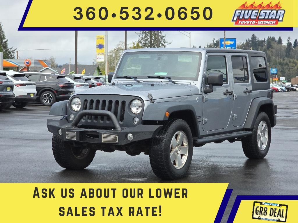 2014 Jeep Wrangler Sport in Billet Metallic Clearcoat — front three-quarter view