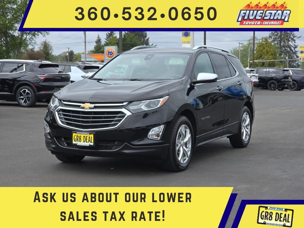 2021 Chevrolet Equinox Premier in Mosaic Black Metallic — front three-quarter view