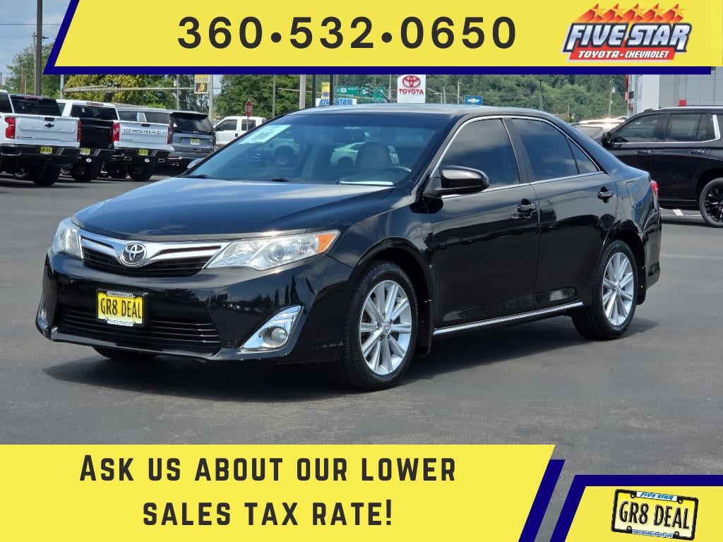 2014 Toyota Camry XLE in Attitude Black Metallic — front three-quarter view