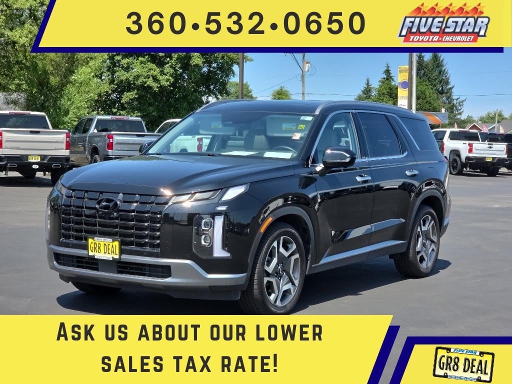 2025 Hyundai Palisade SEL Premium 8P in Abyss Black Pearl — front three-quarter view