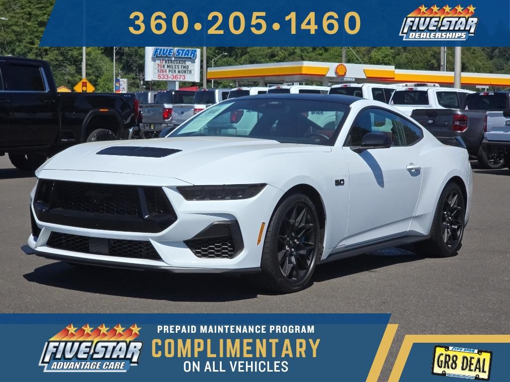 2024 Ford Mustang GT Premium in Oxford White — front three-quarter view