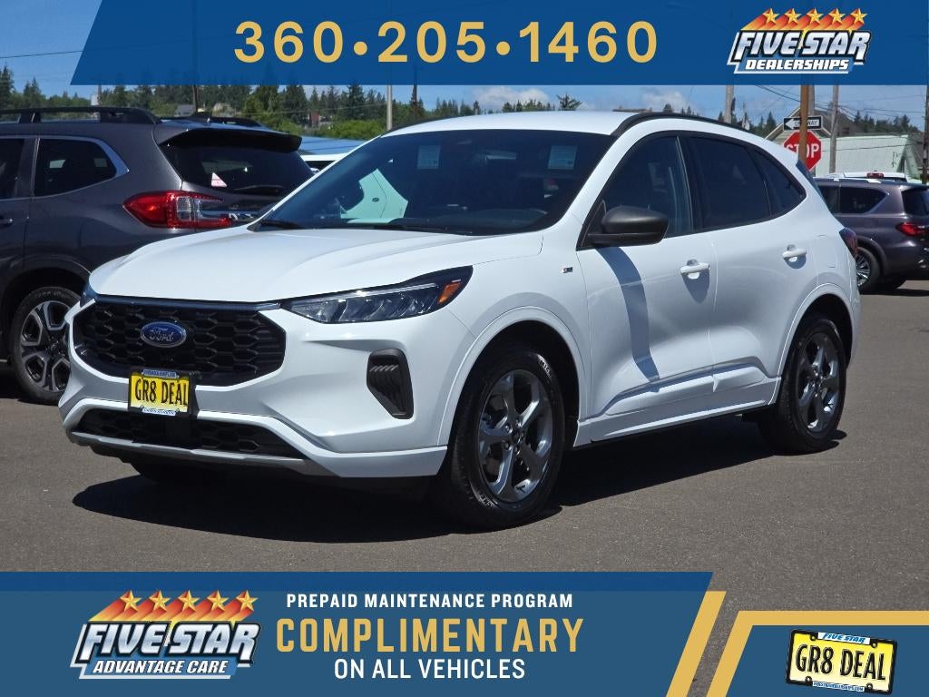 2023 Ford Escape ST-Line in Oxford White — front three-quarter view