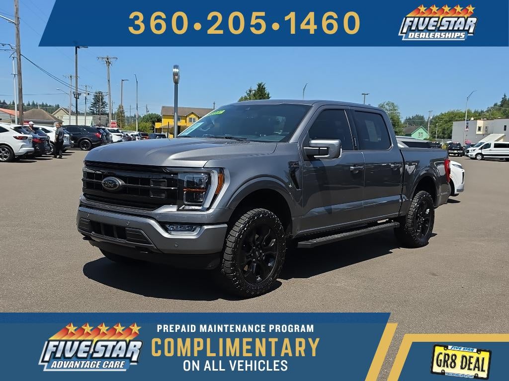 2023 Ford F-150 LARIAT in Carbonized Gray Metallic — front three-quarter view