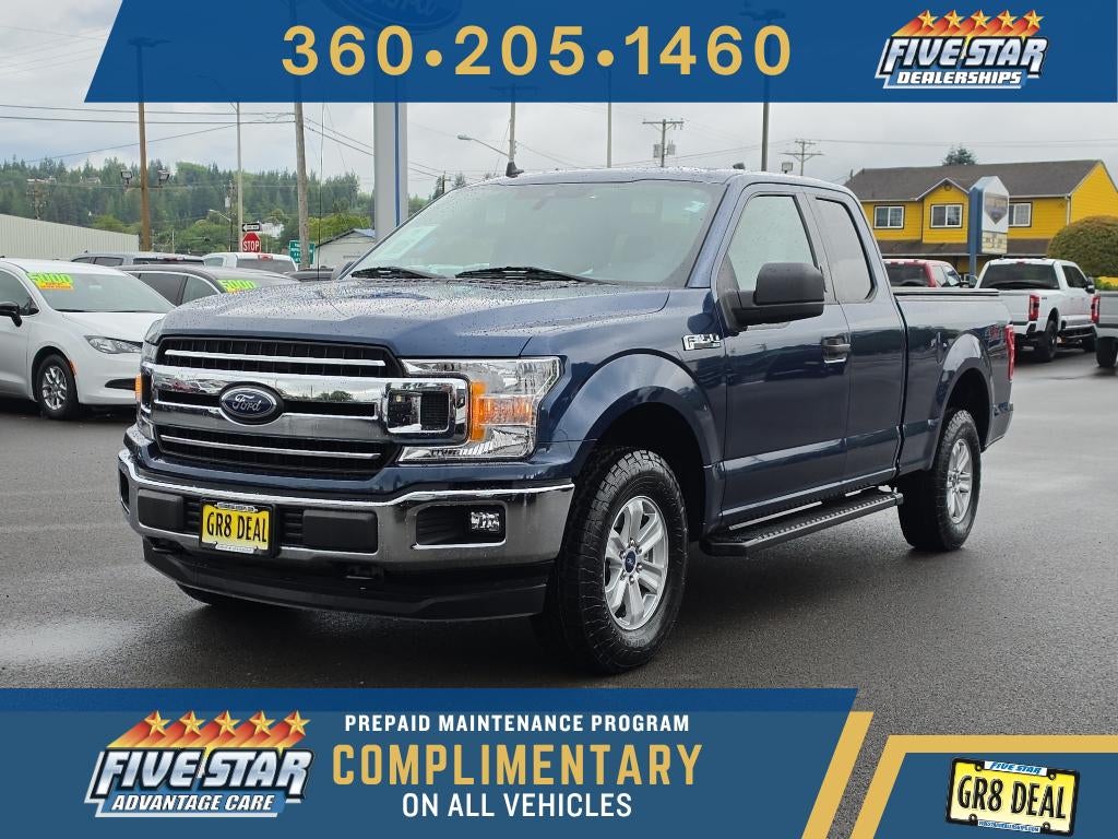 2019 Ford F-150 XLT in Blue Jeans Metallic — front three-quarter view
